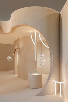 the interior of a modern fashion store with circular lighting