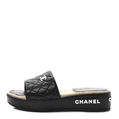 This is an authentic pair of CHANEL Lambskin Quilted CC Espadrille Slip On Sandals size 37 in Black. These casual yet chic sandals feature a black diamond quilted lambskin leather upper with a white Chanel CC logo. Chic Sandals, Slip On Sandals, Diamond Quilt, Cc Logo, Lambskin Leather, Black Diamond, Slip On Sandal, Espadrilles, Leather Upper