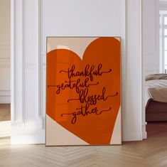 an orange heart with the words grateful written on it in black ink against a white background