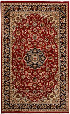 a red and black rug with an ornate design on the center, surrounded by other colors