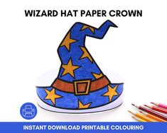 the wizard hat paper crown is next to colored crayon pencils and markers