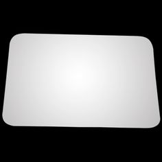 an empty white mouse pad on a black background with space for text or image photo