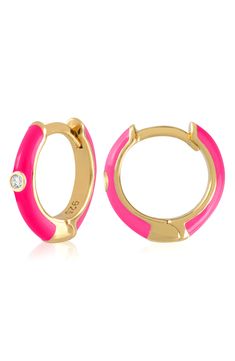 Easy-to-wear hoop earrings will add significant polish to even your most casual ensembles. 1/2" drop; 1/8" width Hinge with snap-post closure Sterling silver with goldtone plate/cubic zirconia Imported Pink Enamel Hoop Earrings, Pink Enamel Hoop Jewelry, Enamel Huggie Hoop Earrings For Pierced Ears, Yellow Gold Enamel Hoop Earrings For Pierced Ears, Trendy Enamel Hoop Jewelry, Trendy Round Enamel Hoop Earrings, Gold Enamel Round Huggie Earrings, Hoop Huggie Earrings In Enamel, Enamel Huggie Hoop Earrings