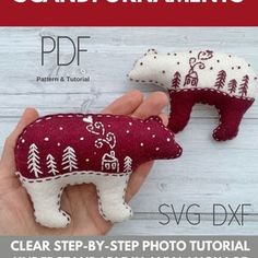 a hand holding two small stuffed animals in red, white and grey colors with the text clear step - by - step photo tutor