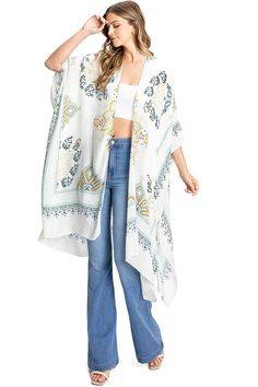 Beautiful boho printed cardigan with an open-front kimono silhouette. Light, sheer fabric is great for layering over casual outfits or as a cover-up. CARE | Hand Wash Cold CONTENTS | 100% Viscose MEASUREMENTS | 46"/117 cm Top to Bottom (Size O/S) MODEL | 5'8 - wearing O/S IMPORTED Bohemian Lightweight Cover-up For Day Out, White V-neck Outerwear For The Beach, White Boho Print Kimono For Beach Cover-up, Casual V-neck Kimono With Boho Print, Casual Fall Cover-up With Kimono Sleeves, Bohemian V-neck Cardigan With Floral Print, Spring Flowy Wrap Cover-up, Casual Boho Print Festival Cover-up, Casual Wrap Cardigan For Beach Cover-up