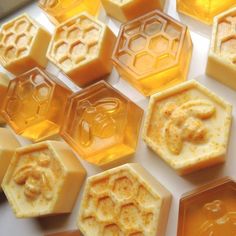 several honeycombs with wax on them sitting next to each other