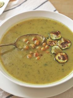 a white bowl filled with soup on top of a table