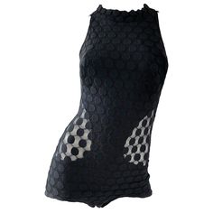 Sexy and rare 1960s GOTTEX black one piece swimsuit or bodysuit with sheer cut-out sides! Features a high neck with an open back. Black on black polka dot print. Semi sheer cut-outs at the side reveal just the right amount of skin. Large hook-and-eye closure at top back neck. Great for the beach, pool, yacht, or perfect as a bodysuit with jeans, shorts or a skirt. In great condition. Approximately Size Extra Small - Medium (lots of stretch) Measurements: 30-40 inch bust 24-32 inch waist Sheer Skirt Outfit, 80s Swimsuit, Gottex Swimwear, Body Noir, Swimsuit With Shorts, Vintage Swimsuit, Vintage Swimwear, Cute Lazy Outfits, Black One Piece Swimsuit