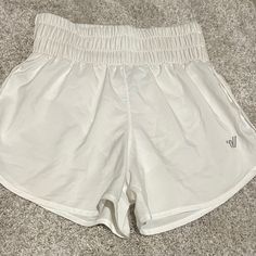 Nwot Varsity Spirit Cheer Shorts In White, Size Xs. Item Was Never Worn. White Athleisure Athletic Shorts For Cheerleading, White Athleisure Shorts For Cheerleading, White Shorts For Cheerleading, White Varsity Tops For Cheerleading, Cheer Pajamas, Moisture-wicking Shorts For Cheerleading, Cheer Shorts, Varsity Cheer, Shorts Athletic