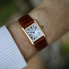 Introducing the iconic Cartier Tank 2441, a watch that has stood the test of time since its inception in 1917. This classic timepiece was designed by Louis Cartier himself, inspired by the shape of a military tank. The Tank has since become a symbol of elegance and sophistication, worn by the likes of Jackie Kennedy and Princess Diana. Crafted from durable stainless steel, the Tank 2441 features a sleek and minimalist design, with a closed caseback and mineral glass. The quartz movement ensures Cartier Tank Louis, Military Tank, Cartier Tank, Tanks Military, Princesa Diana, Inception, Watch Model, Princess Diana, Watch Brands