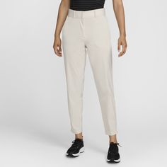 Stride confidently onto the course in these easy-fitting, sweat-wicking pants. With plenty of storage and stretch, you'll feel cool and collected as you line up your shot and take your swing. Athleisure Stretch Bottoms For Golf, Stretch Athleisure Bottoms For Golf, Sporty White Bottoms For Golf, Casual Stretch Pants For Golf, Casual Stretch Golf Pants, Fitted Athleisure Bottoms For Golf, Casual Nike Golf Bottoms, Fitted Tapered Leg Golf Pants, Casual Tapered Leg Golf Pants