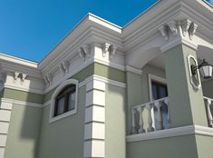 a large house with white trim on the windows and balconies is shown in this 3d image