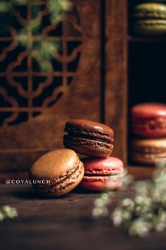 three macaroons sitting next to each other on a table