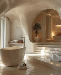 a large white bath tub sitting inside of a bathroom