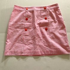 New Without Tags Cotton Lined Skirt With Coral/Pink And White Stripes Cute Button Detail Size 6 18” Long Preppy Summer Mini Skirt, Cute Cotton Bottoms With Buttons, Preppy Cotton Skirt, Pink Mini Skirt With Button Closure, Pink Skirt With Button Closure, Preppy Pink Cotton Skirt, Pink Cotton Preppy Skort, Preppy Pink Cotton Skort, Fitted Cotton Skort With Buttons