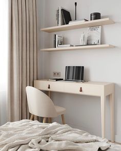 a bedroom with a bed, desk and bookshelf in the corner next to a window