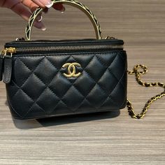 Chanel Vanity Bag With Mirror High-end Everyday Luxury Crossbody Bag, Light Luxury Everyday Rectangular Bag, Luxury Box Bag With Detachable Handle For Shopping, Luxury Shopping Box Bag With Detachable Handle, High-end Black Crossbody Box Bag, High-end Black Shoulder Box Bag, Designer Pouch Box Bag With Detachable Handle, Designer Box Bag With Detachable Handle, High-end Black Bag With Removable Pouch