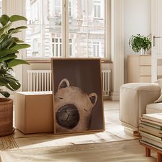 a living room with a couch, chair and painting on the wall next to a potted plant