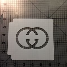 a piece of paper with the letter g on it