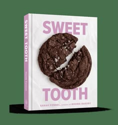 the sweet tooth book is open to reveal a chocolate cookie