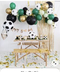 a soccer themed birthday party with balloons, streamers and confetti on the table