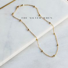 This dainty gold chain necklace, perfect for layering or a minimalist look. •18kt gold plated -lead, nickel & cadmium free•Heavy plating, tarnish resistant, water friendly Dainty Gold Chain, Beaded Chain Necklace, Gold Bead Necklace, Gem Necklace, Personalized Bracelets, Gold Chain Necklace, Dainty Necklace, Gold Beads, Beaded Chain