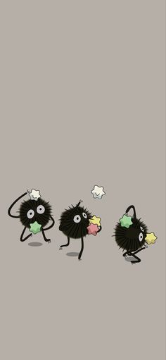 three black animals with different colored spots on their faces and legs, one is holding an umbrella