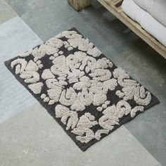 a black and white rug on the floor