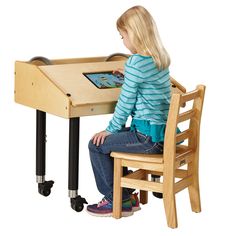 Optimize your youth computer lab or technology area with this Jonti-Craft Baltic Birch 3395JCM 27" x 21" x 27"-38" mobile children's single wood tablet table with storage. Designed for single use, this clever tablet table provides an ergonomic way to keep children engaged in digital learning activities while providing discrete space for individual learners. The table keeps expensive tablets secure behind a scratch-proof mounting area which also positions the screen 3" below the table surface for Table Stationary, Mobile Table, Childrens Table, Stylus Pens, Homeschool Organization, Computer Table, Digital Learning, Early Learning, Early Childhood