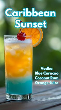 a blue curacao cocktail with an orange slice on the rim and text that reads, caribean sunset