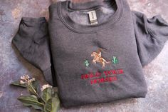 This Gender-Neutral Adult Hoodies & Sweatshirts item by NostalGiftShop has 3 favorites from Etsy shoppers. Ships from Niagara Falls, NY. Listed on Oct 12, 2024 Horses Western, Hold Your Horses, Aesthetic Sweaters, Advanced Embroidery, Cowboy Rodeo, Information Processing, Trendy Aesthetic, Western Cowgirls, Cow Girl