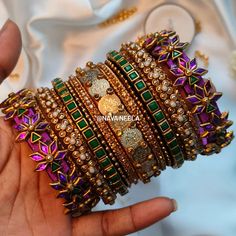 In purple and gold, a lily grand, 💜🌟 Elegant designs, crafted by hand, ✨ The bridal queen, in beauty, will stand. 👰‍♀️👑 . . . Design Code - Nava0097 . . “Get yours now in your favorite color! 🎨✨" . . "Customize bangles with raw silk thread! 🎨💫@nava.neela" . . DM us on Instagram or WhatsApp to 8300830771 . . #navaneela #bangles #silkthreadbangles #silkthreadjewelry #kundanbangles #weddingbangles #bridalbangles #returngifts #festivebangles #southindianbangles #bride #bangleset #weddinginspirati... Gold Jewelry Outfits, Bangles Set