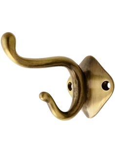 an antique brass door handle on a white background