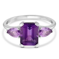 This amethyst ring is truly a beautiful and timeless piece of jewelry. At its center lies an exquisite emerald-cut amethyst, expertly cut and polished, with a pear-shaped brilliant cut amethyst sparkling on either side, all set in polished 10K white gold. | Amethyst Ring | 10K White Gold | Size 10 | 1mm | Helzberg Diamonds Gold Amethyst Ring, Measure Ring Size, Country Rings, Helzberg Diamonds, Emerald Stone, Timeless Jewelry, Gold Price, Ring Size Guide, Amethyst Stone