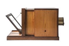 an old fashioned wooden radio on a white background