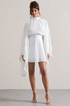 Charity | White Pleated High-Neck Mini Dress With Cape Sleeves Dress With Cape Sleeves, Dress With Cape, Club L London, High Neck Mini Dress, Black Dress Prom, Strappy Stilettos, Black Tie Gala, Cape Sleeves, Christmas Party Dress