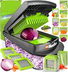 the mueller vegetable slicer is open and ready to be used for cutting onions, cabbages, and other vegetables