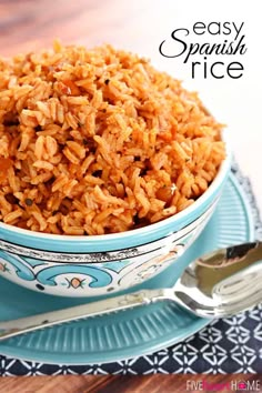 a bowl filled with brown rice on top of a blue plate