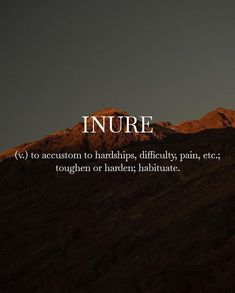 an image of a mountain with the words injury written in white on it's side