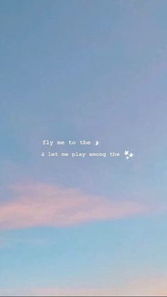 an airplane flying in the sky with a quote above it that says fly me to the moon and let me play among the stars