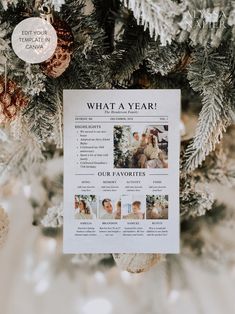 a christmas ornament hanging from the top of a tree with pictures on it