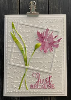 a close up of a card with flowers on it and the words just because written in pink