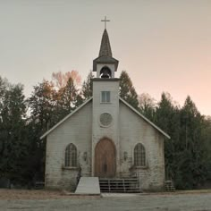 an old church with a steeple on the top