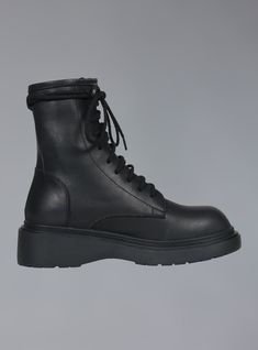 The perfect boot doesn't exi... The Hagen Boot is a combat lace-up boot with a supple leather upper and a solid rubber sole. Features include elongated laces for a wrap-around at the top and a rounded toebox. Sole measures .5" at the front to 1.5" at the heel. Click Here for a printable size chart (make sure you print at Actual Size to ensure accuracy) For any questions about sizing please reach out to our team ~ help@unifclothing.com All shoes are in US Womens sizing. For "men's" size conversio Unif Boots, Secret Sale, Platform Boots, Shoe Sale, Lace Up Boots, Shoe Shop, New Shoes, Me Too Shoes, Combat Boots