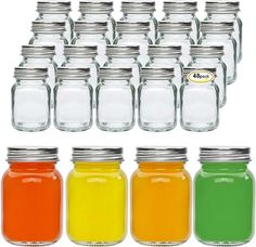 many different colors of liquid are in the glass jars with lids on each one side