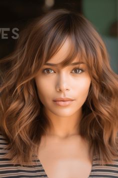 For a timeless and versatile look, consider trying medium-length chestnut hair featuring soft bangs. This style incorporates volumizing layers throughout the hair to create fullness and depth. Click here to check out more waterfall fringe bangs hair ideas. Medium Length Hair With Bangs, Short Hair Cuts For Round Faces, Rambut Brunette, Chestnut Hair, Fringe Bangs, Haircuts With Bangs