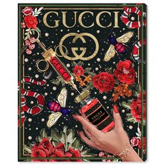 a woman's hand holding a bottle of red nail polish in front of a gucci poster