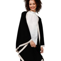 A sumptuously soft cape with a striking two-tone palette, the Colorado Cape is the ultimate style for warming up this winter. The perfect piece for throwing on over jeans and boots - you'll achieve effortless style with ease. • Open front• Contrast rib neckline and hem• Fine knit• One size garment 72% Viscose28% Nylon Body Width: OS: 128cmLength: OS: 72cm Care: cold hand wash with like colors do not bleach do not tumble dry, do not ring or twist dry flat do not iron do not dry clean Versatile Winter Layering Wraps, Versatile Winter Wraps For Layering, Winter Layering Wraps, Chic Winter Layering Wrap, Chic Winter Layering Wraps, Chic Winter Wraps For Layering, Winter Wraps For Layering, Jeans Boots, Warming Up