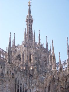 an ornate building with many spires on top