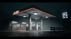 an empty gas station at night with lights on